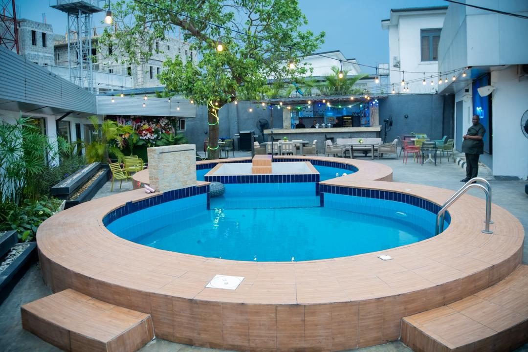 Outdoor swimming pool at LeSam Hotels and Suites